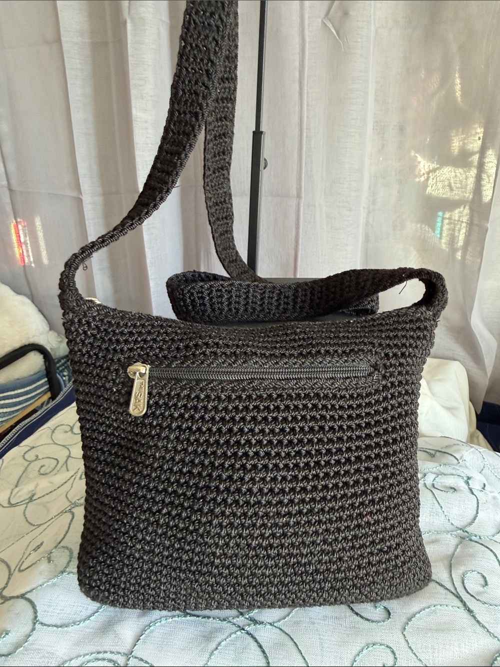 The Sak Black Handwoven Shoulder Bag
